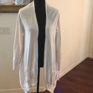 White sweater with tags